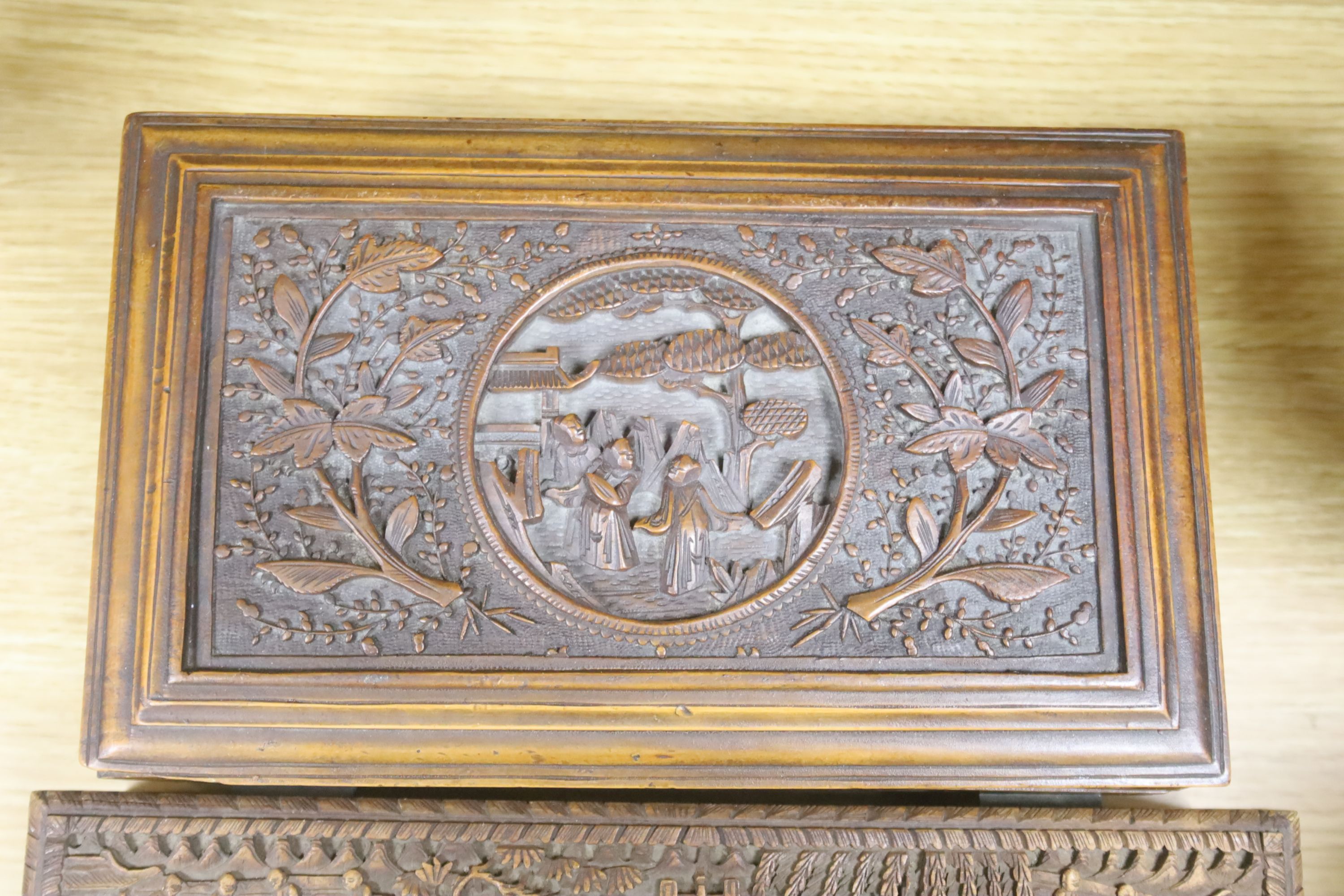 Three 19th century Chinese carved sandalwood boxes, 19th/20th century, longest 30cm